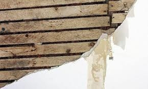 Picture of a wall with falling plaster in New York City.